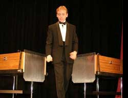 Picture of Scott performing the Wakeling Sawing Through